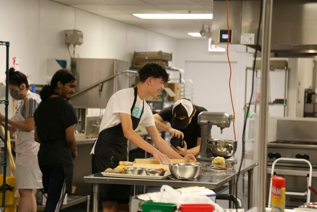 Photo of ASM student in a culinary class
