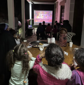 Photo of children watching Encanto