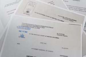 Official Canadian Supreme Court documents spread out.