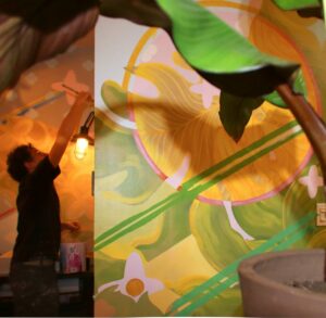 Photo of John Gingrich painting
