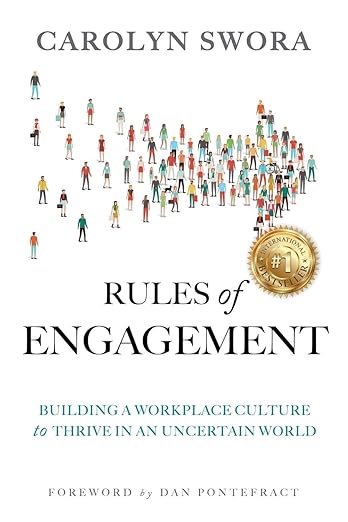 Book cover of "Rules of Engagement" by Carolyn Swora, an alumni author, featuring small illustrated people above the title, a gold award seal, and a subtitle about workplace culture and empowering stories.